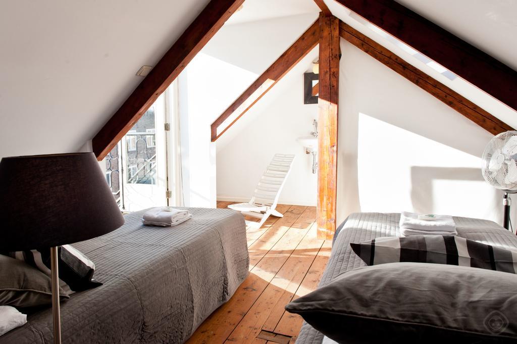 Canal Holiday Apartment Ámsterdam Habitación foto